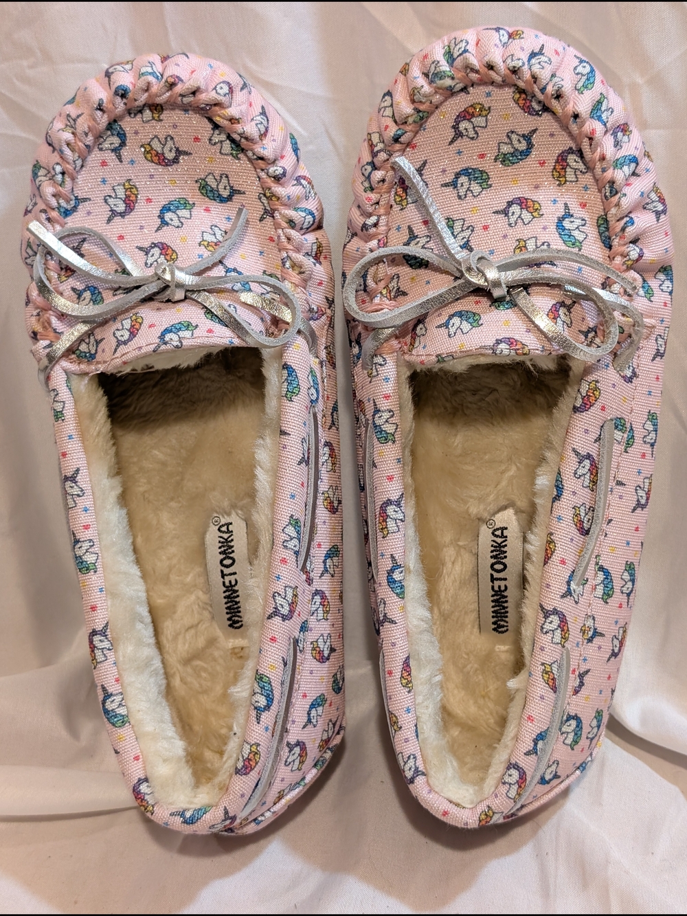 Minnetonka Pink Unicorn Print Moccasin Slippers with Silver Bow Accent